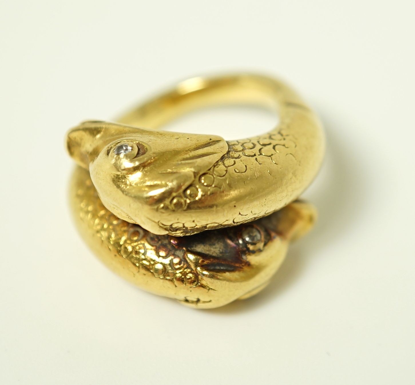 A yellow metal, sapphire an diamond set four stone dress ring, size L, gross 3.4 grams.